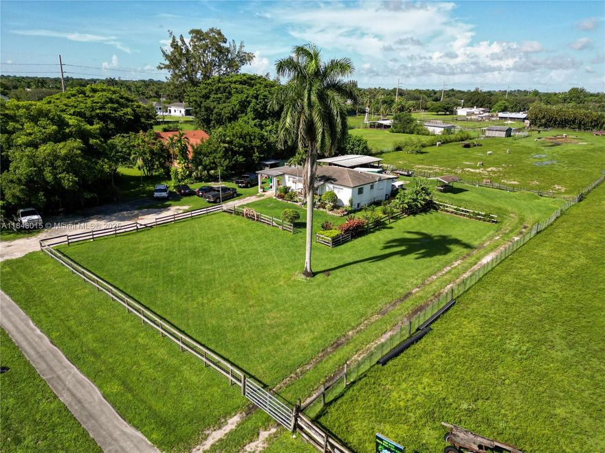Set on a builder's acre lot in the heart of Davie. This property offers an opportunity to create your own dream retreat. Features 3 bedrooms, 2 bathrooms with a den that can be used as an office or a walk-in pantry. The back yard has 6 stall horse barn and a feeding hay rack with its farmhouse appeal and room to grow, this property is ready for your personal vision. The house is currently rented to wonderful tenants so please allow 24 hours' notice.