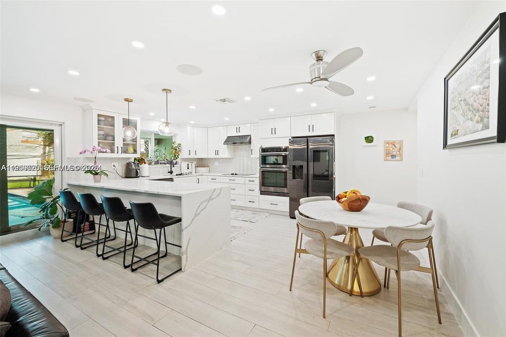 Photo of 5021 SW 29th Ter, Dania Beach, FL 33312 (MLS # A11959725)