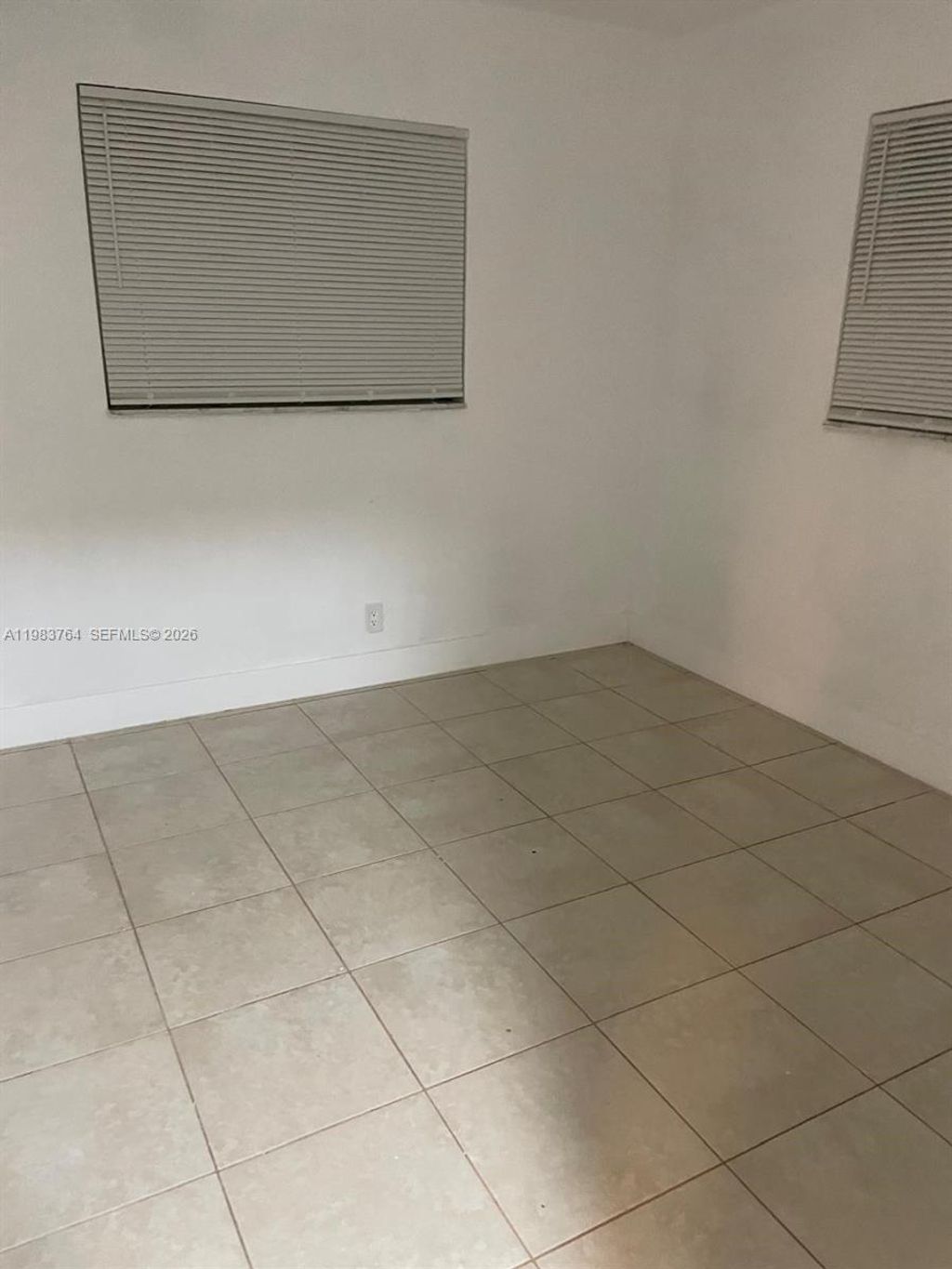 Photo of 210 NE 40th Ct #1-2, Oakland Park, FL 33334 (MLS # A11983764)