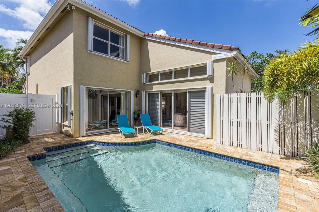 Photo of 1125 Queen Palm Ct, Hollywood, FL 33019 (MLS # A12008579)