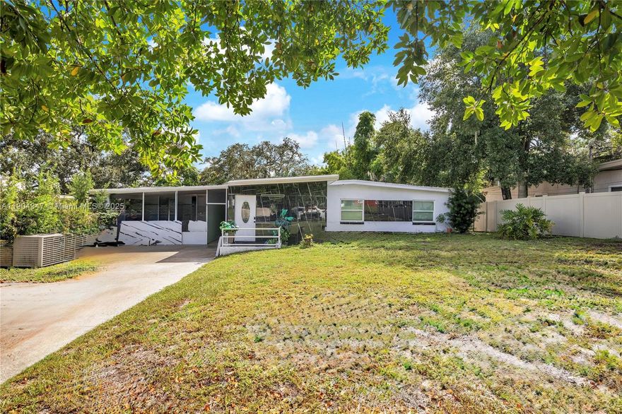 Discover this stunning single-family home nestled in the highly sought-after Lake Cane Villa community. Perfectly positioned on a spacious 1.33-acre lot with direct lake access and breathtaking water views. Offers a rare blend of comfort, functionality, and serene Florida living. Step inside and be greeted by a bright, open-concept floor plan. The inviting living area is complemented by large windows and skylights. The kitchen features solid wood cabinets, stone countertops, and stainless steel appliances, including a convection oven, microwave, and refrigerator. Step outside to enjoy a private backyard oasis, complete with a patio and expansive deck perfect for outdoor dining, morning coffee, or sunsets overlooking the lake. Include ample parking spaces and no HOA fees.