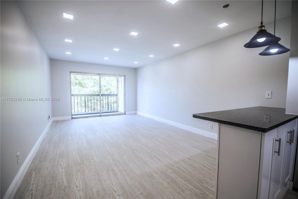 Photo of 2755 W Atlantic Ave #207A, Delray Beach, FL 33445 (MLS # A11755248)