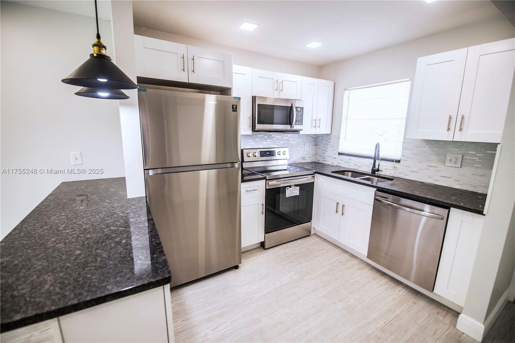 Photo of 2755 W Atlantic Ave #207A, Delray Beach, FL 33445 (MLS # A11755248)