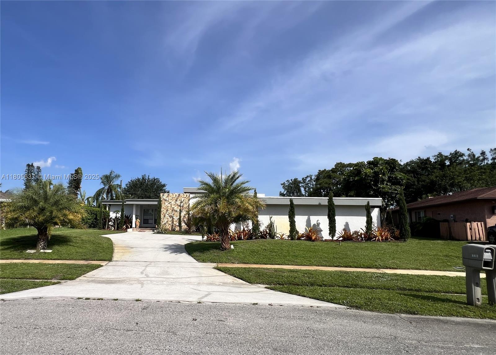 One-of-a-Kind Golf Course Estate on Palm Beach National
Spanning over 5,000 SQFT, this exceptional single-story courtyard home backs directly onto the 1st hole of Palm Beach National Golf Course, offering stunning views and unmatched privacy. The main residence features 4 bedrooms and 3 baths, including a detached master suite with private access to the pool and golf course, ideal for guests, office, or income potential. Entertain effortlessly in the billiard room with wet bar or relax in one of the multiple living, family, and dining areas.