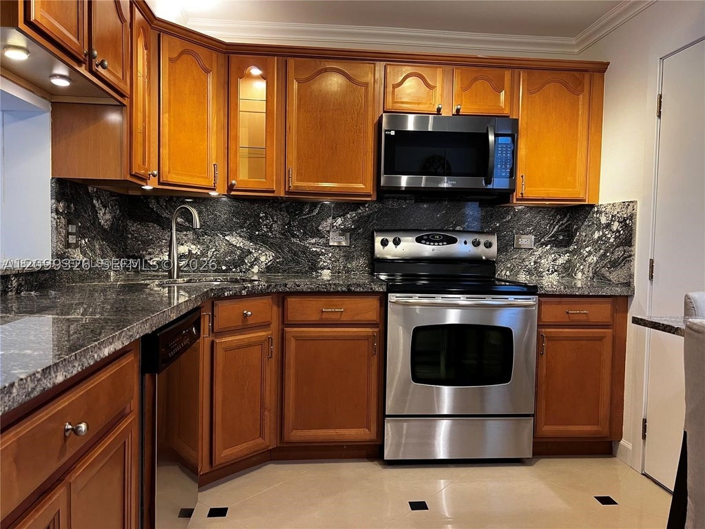 Photo of 320 NE 12th Ave #605, Hallandale Beach, FL 33009 (MLS # A12099326)