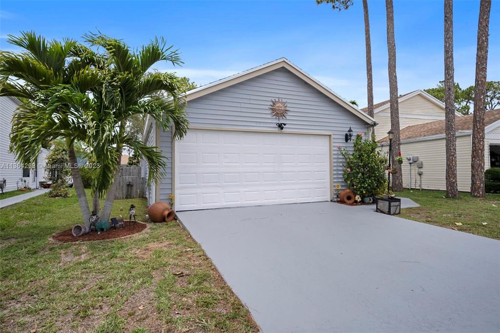 Photo of 5585 W Berry Blossom Way W, West Palm Beach, FL 33415 (MLS # A11384293)