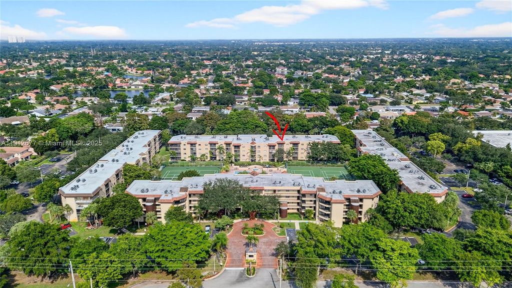 Photo of 10501 W Broward Blvd #104, Plantation, FL 33324 (MLS # A11912677)