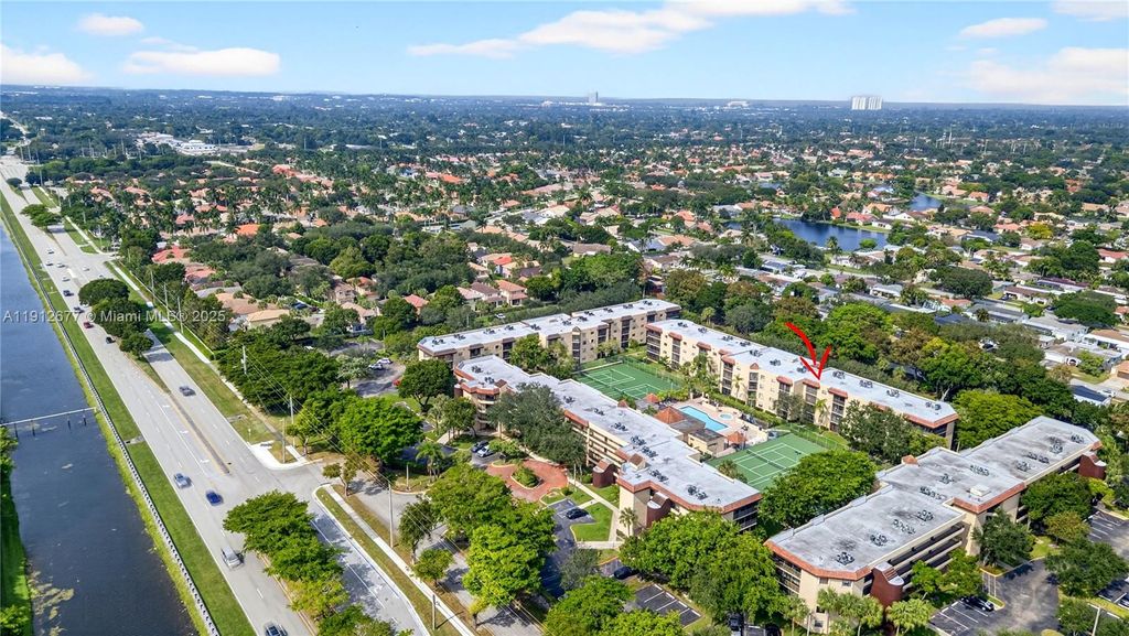 Photo of 10501 W Broward Blvd #104, Plantation, FL 33324 (MLS # A11912677)