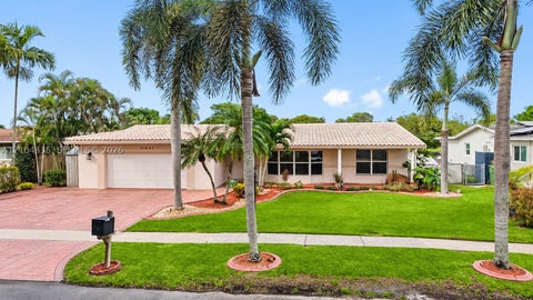 Photo of 11031 NW 22nd St, Pembroke Pines, FL 33026 (MLS # A12104335)