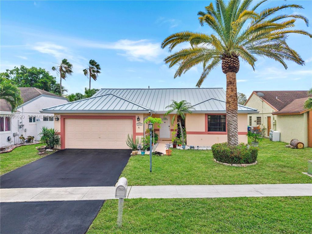 Photo of 15092 SW 13th Pl, Sunrise, FL 33326 (MLS # A11991620)