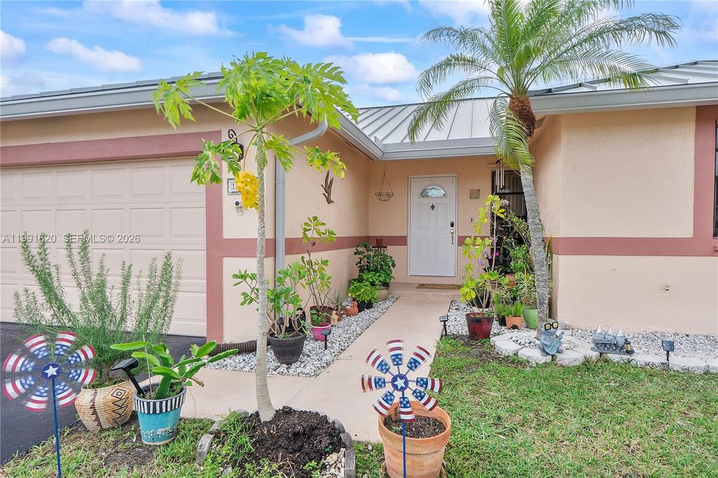 Photo of 15092 SW 13th Pl, Sunrise, FL 33326 (MLS # A11991620)