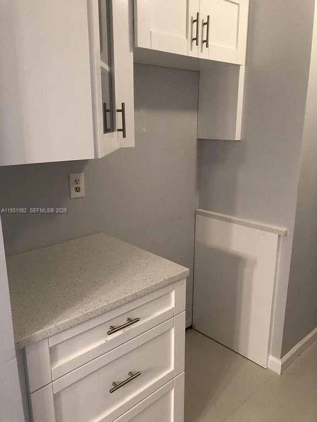 Photo of 1133 N Benoist Farms Rd #103, West Palm Beach, FL 33411 (MLS # A11931052)