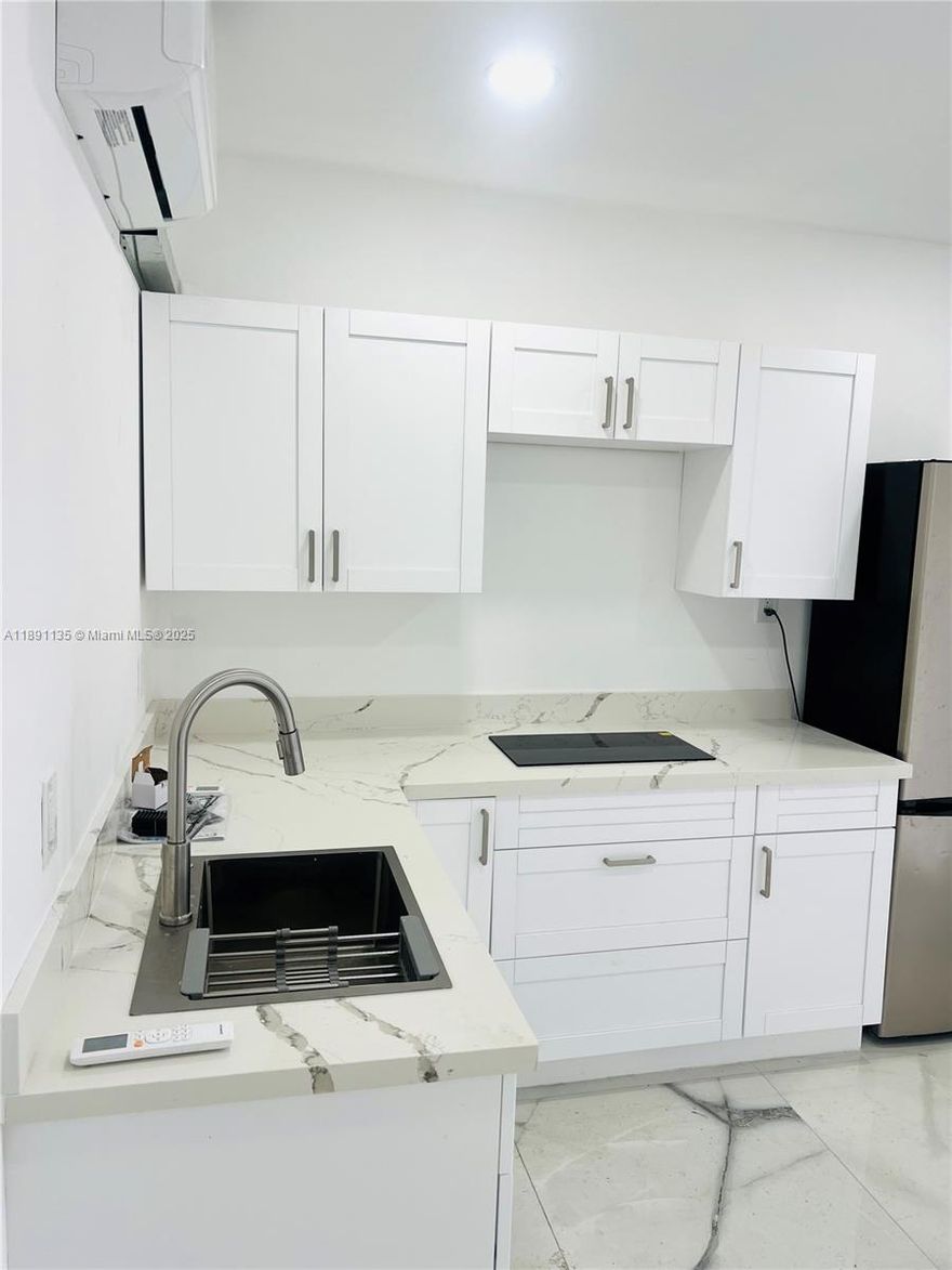 Only 1st month and 1 security deposit! All credits welcome. Ideal for up to 2 people, with parking for 2 cars. All utilities and internet included. Pets are welcome! Enjoy the privacy of this brand-new apartment featuring 1 bedroom, 1 bathroom, and a full kitchen. Beautiful new tiles throughout, plus a small paved patio for your comfort. You’ll deal directly with the owner and get same-day approval. Independent entrance and two split A/C units for your comfort. Hurry—won’t last!