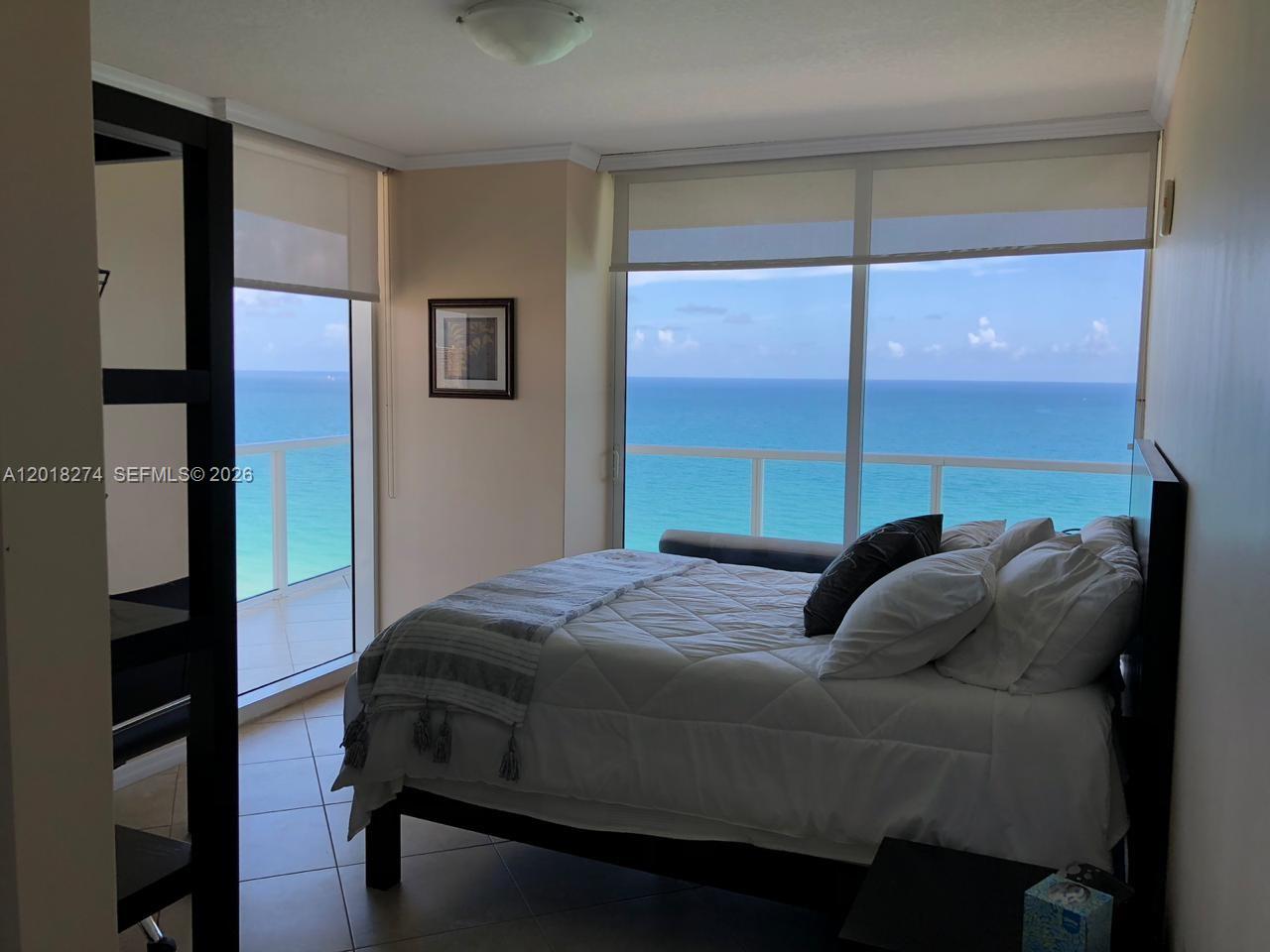 Properties 2 16699 Collins Ave 2003