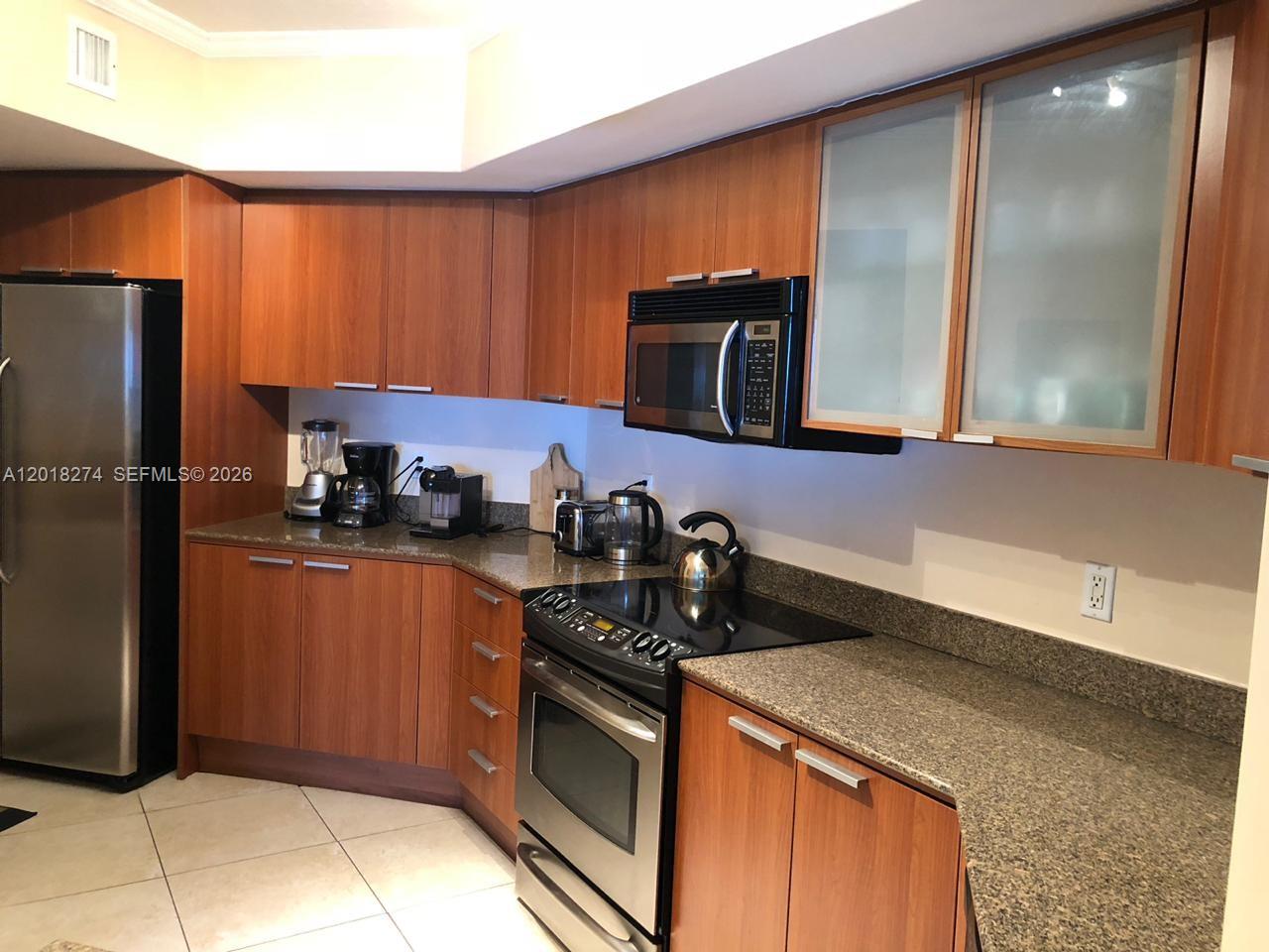 Properties 4 16699 Collins Ave 2003