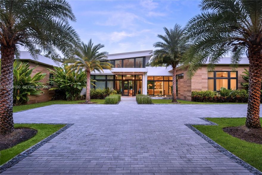 A rare offering combining architectural integrity, modern luxury, and creative functionality !  A 2019 one-story Hollub custom built residence, offering 5 bedrooms and 5 bathrooms on a quiet, beautiful street in North Pinecrest. Thoughtfully designed with clean lines, warm materials, and seamless indoor-outdoor flow, this home is ideal for both everyday living and sophisticated entertaining.
The interiors feature remarkable entertaining spaces, including a fully built-out private theater, a dedicated study, gym with sauna and  a professional recording studio that can be easily converted into an additional bedroom and bathroom, offering flexibility for evolving needs. Every space reflects meticulous attention to detail, with top-tier finishes, refined design, and exceptional craftsmanship throughout.
Outdoors, lush landscaping frames a resort-style pool and inviting entertainment areas, creating a private oasis perfect for gatherings or quiet relaxation. The home also features a bar, expansive living areas, and effortless circulation between interior and exterior spaces. Generator!!
Designer furniture may be included, offering a truly turnkey opportunity.