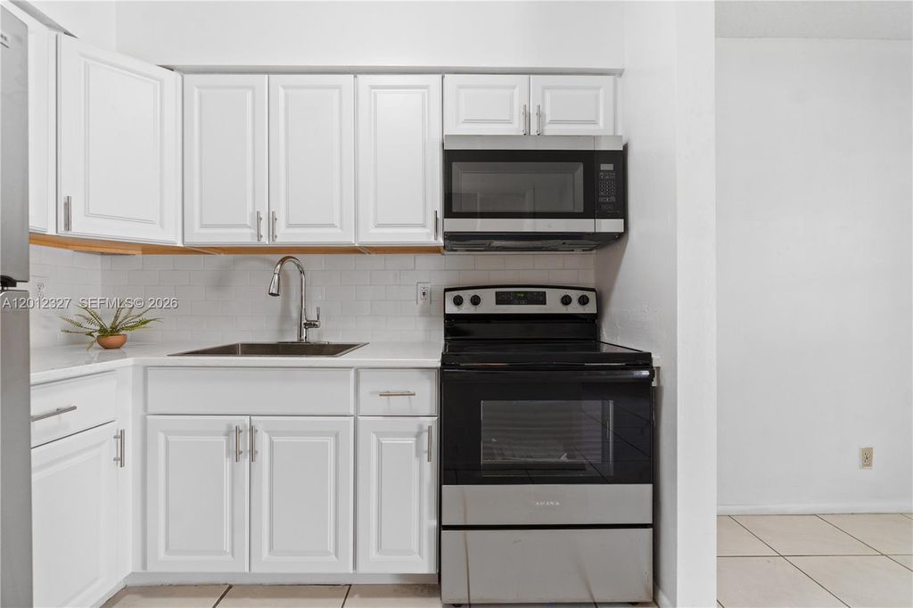 Photo of 2325 NW 52nd Ct #2325, Fort Lauderdale, FL 33309 (MLS # A12012327)