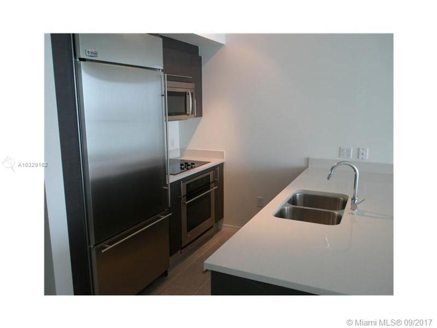 Largest 1 Bedroom plus Den at 500 Brickell! Unit features beautiful grey wood laminate flooring (no carpet), large walk-in closet, two sinks in bathroom, and separate shower + tub. Building has rooftop pool, resistance lap pool, gym, theater room, party room, restaurants, and more. One block from Brickell City Centre, next to metro mover, and walking distance to Mary Brickell Village. Available September 27th.