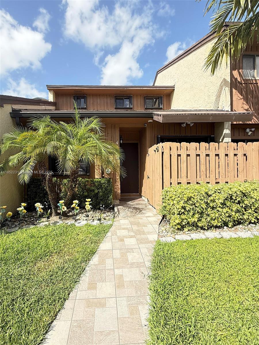 Welcome to Reflections at Pine Island Lake community. Beautiful 2-story townhome located in the heart of Davie. This unit features 2 bedrooms and 2 bathrooms, with a unique layout offering privacy and comfort. Upstairs, enjoy a private primary suite with wood flooring, walk-in closet, and full bath. Downstairs offers a second bedroom, full bath, ceramic tile floors, laundry room equipped, and direct lake access. The kitchen comes fully equipped. Community amenities include a swimming pool, tennis courts, and beautiful lake. Centrally located near Nova Southeastern University, Broward College, top-rated schools, Publix, and major shopping centers. Easy access to I-595, restaurants, and parks.