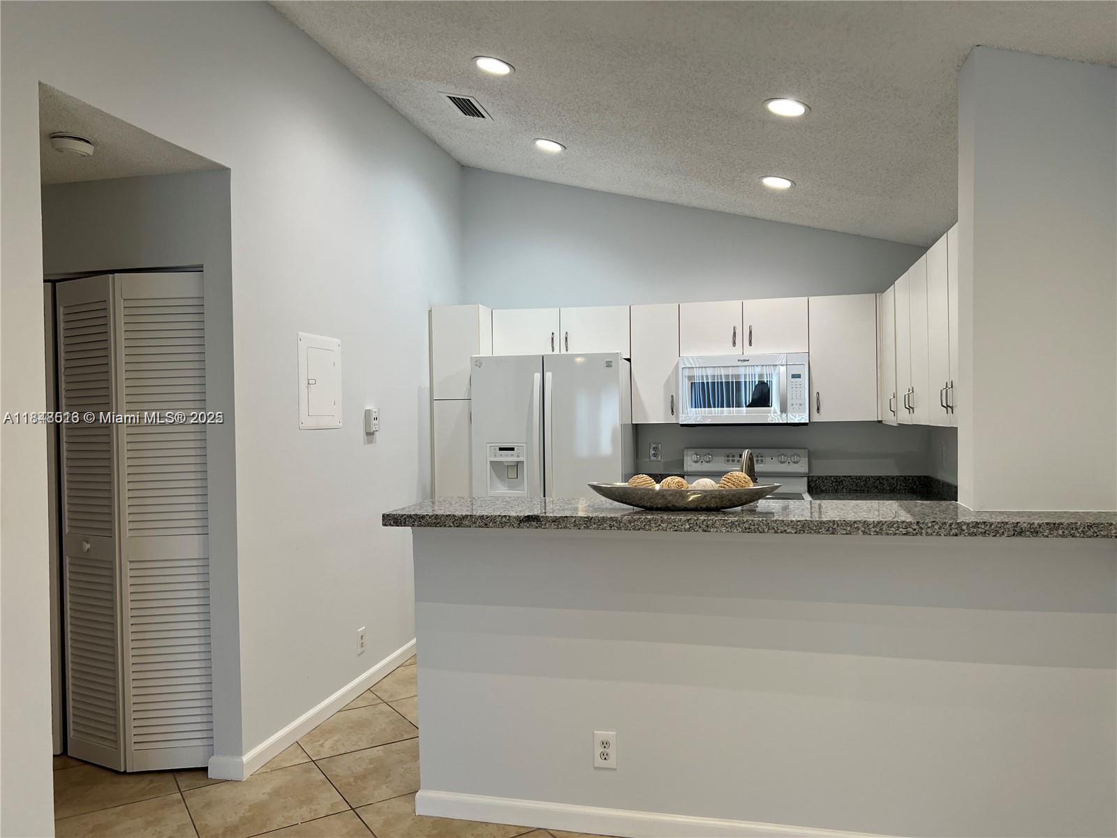 wow spectacular unit with a garage, perfect location, just painted and remodeled, new floor on bedrooms, private
entrance thru side stairs, and direct access to own garage. large unit with 2 bedrooms, and 2 full bath and a large living dining area with an open kitchen.