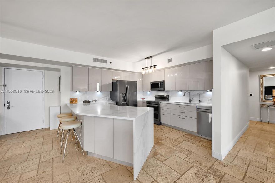 Beautifully furnished corner residence offering 1,782 sq. ft. of living space. This elegant Model C features 2 bedrooms and 2 bathrooms, complemented by over 450 sq. ft. of expansive wraparound balconies. Situated on the desirable northwest corner, the unit showcases breathtaking ocean and Intracoastal views from two private terraces. Interior highlights include designer finishes, a Jacuzzi tub in the primary bathroom, a European-style kitchen, and premium KitchenAid appliances. Enjoy a true resort-style lifestyle with world-class amenities, including infinity-edge pools, a full-service spa, a 50,000 sq. ft. oceanfront fitness center, daily fitness classes, on-site restaurants, as well as pool and beach service, and valet.