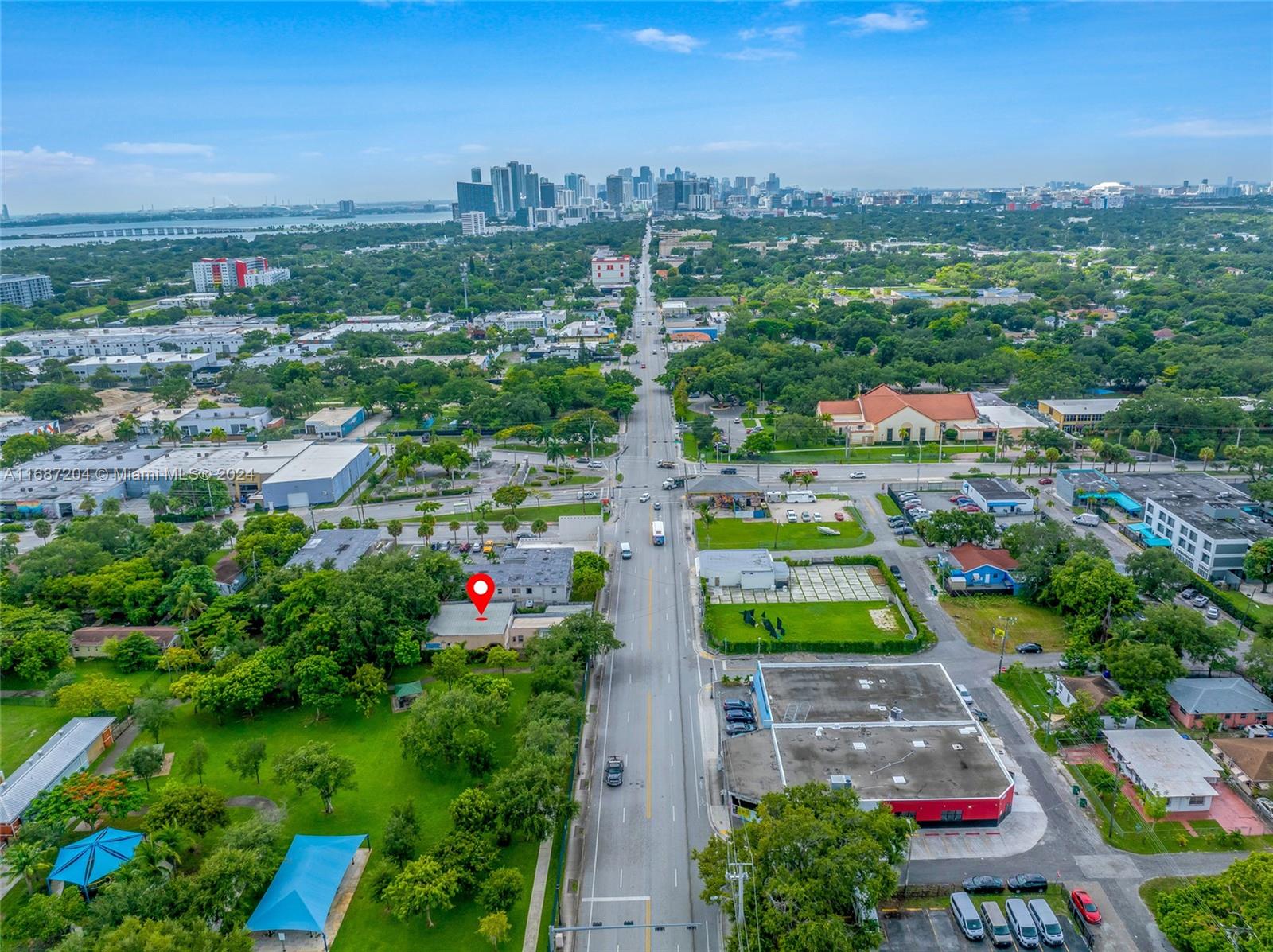 An exceptional covered land play on a 12,000 sf site with T-5-0 mixed-use high density zoning with a with the potential to generate $8k per month which works as a strong covered land play for developers working towards site plan approval.Current plans submitted consist of18 units consisting of 3 bedrooms.This market is suffering a crisis of housing, and with virtually 0%vacancy, these units will rent fast when built and rents will keep growing over time. The site benefits from great proximity toMiami's Design district, Wynwood, Magic city, Midtown and Miami’s Civic center.