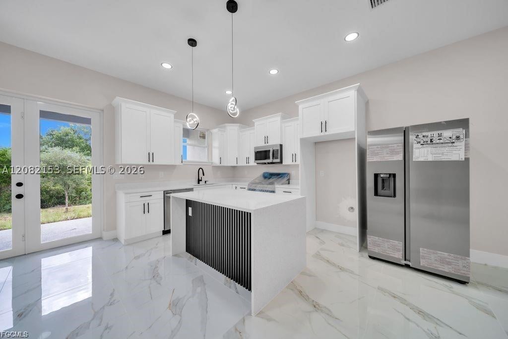 4648/4650 Leonard Blvd S