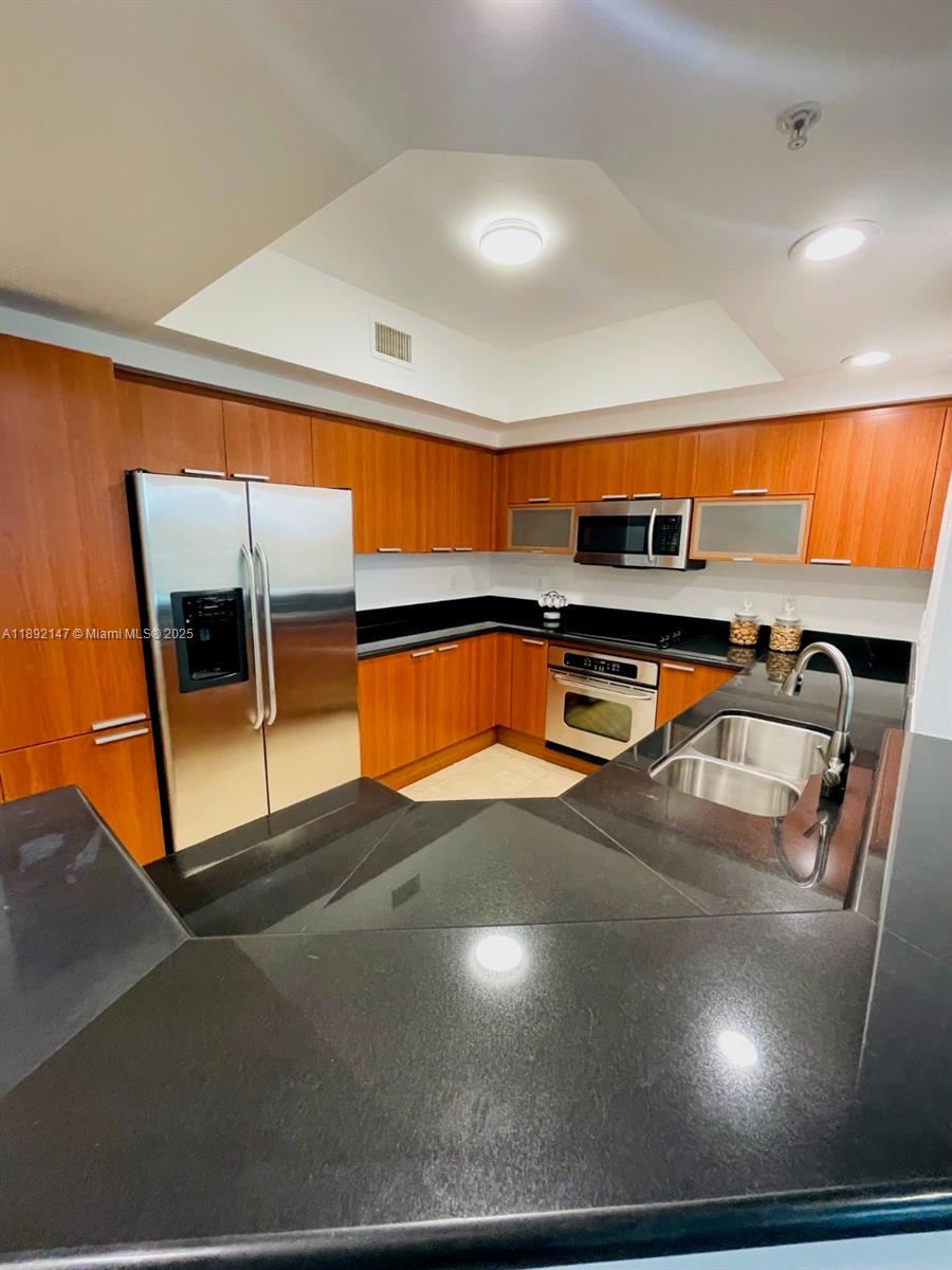 THE OAKS I CONDO - Residential Lease