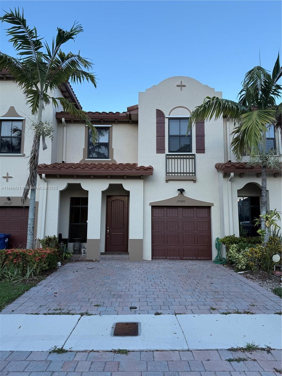 Welcome to this lovely 3/2.5 townhome in a guarded, quiet, family community with many amenities! Very well kept 2 story townhome with a layout for entertaining. Laminate wood flooring upstairs updated in 2023 with the exterior and interior being freshly painted this year. The home includes a half bathroom downstairs and 3 bedrooms with 2 full bathrooms upstairs. The yard is completely paved and fenced in for privacy. Amenities in the community include a community pool and clubhouse, gym, children's playground, dog park and more! Located near top-rated schools, parks, shopping, and dining, with easy access to major roads. Please call/text agent to schedule showings.