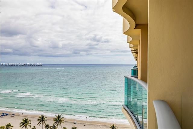 Annual or short Term rent. Beautiful 1BD 1,5 BA Condo fully Furnished, minimum 3 Months Rent. Washer and dryer in the unit, King size bed, all utilities are included. Ocean front Building, attended beach service, heated Pool, cafe, new GYM, Parking. Available September 7 2025.