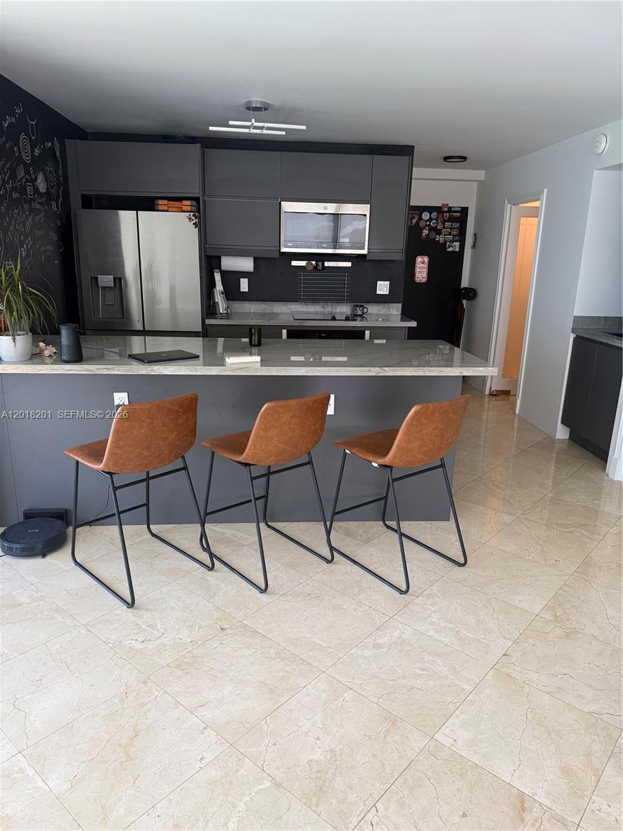 Properties 2 5750 Collins Ave 9K