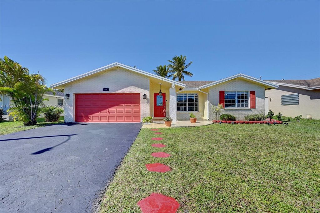 Photo of 8301 NW 98th Ave, Tamarac, FL 33321 (MLS # A11537071)
