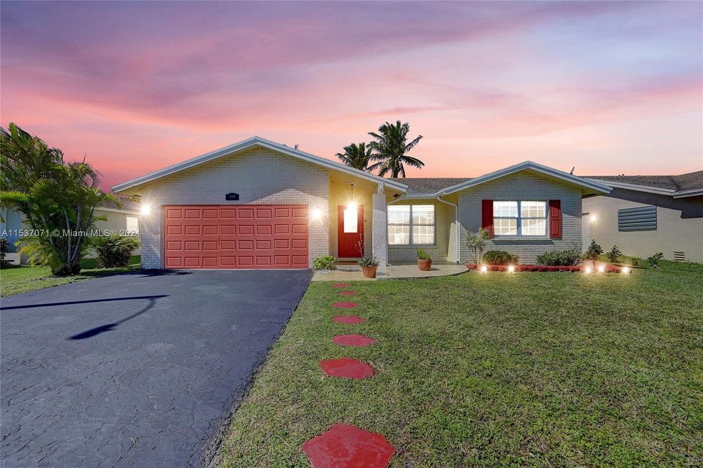 Photo of 8301 NW 98th Ave, Tamarac, FL 33321 (MLS # A11537071)