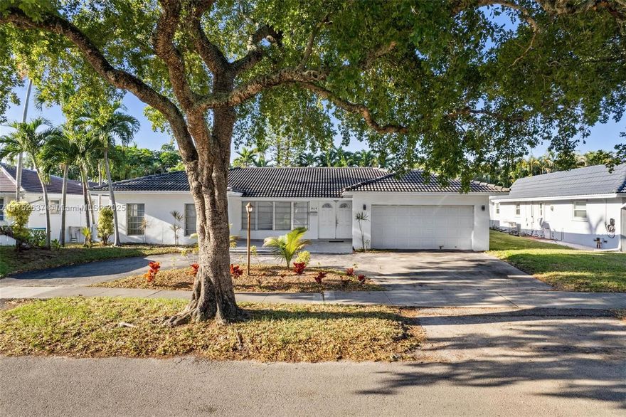 Exclusively located in the prestigious Cloisters of Emerald Hills in Hollywood, FL, this legal 4-bedroom, 3-bath home sits on a nearly 10K sqft lot. Enter into an open floor plan filled with natural light and captivating views of the sparkling pool. The gourmet kitchen features quartz countertops, expansive workspace, and custom cabinetry—perfect for entertaining. Enjoy updated plumbing, new flooring, and generously sized bedrooms with ample storage. The luxurious master suite offers a renovated bath and a private retreat ambiance. Discover upscale living in this sought-after Hollywood neighborhood.