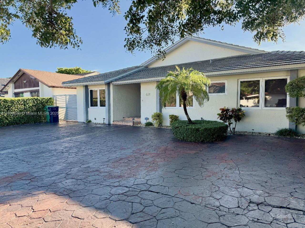 This move-in ready 3-bedroom, 2.5-bath home blends modern updates with everyday comfort in one perfect package. Inside, you’ll find a sleek kitchen with stainless steel appliances, granite countertops, and recessed lighting, along with fully remodeled bathrooms. Recent upgrades include impact windows, a brand new roof, new A/C system, water heater, washer, and dryer, giving you peace of mind for years to come. Includes a large covered terrace great for entertaining or outdoor living, while ample parking, plus space on the side for two cars adds extra convenience. Ideally located near FIU, Florida’s Turnpike, and the 836 Expressway. Instant easy access to showings via requests on Showingtime. Call or text with any questions.