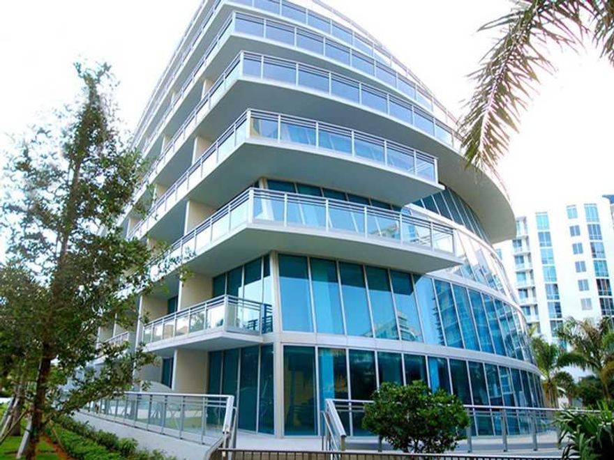 Pristine Duplex Apartment for rent at Artech: 1 Master Suite upstairs and Den closed as second Bedroom / Office downstairs. Luxury modern architecture waterfront building in Aventura, unique amenities: 2 tennis courts, movie theater, 3 pools, party room f or 1,000 people, security and valet 24 hrs. Mega gym, private marina with docks available. Vacant and ready to move in.