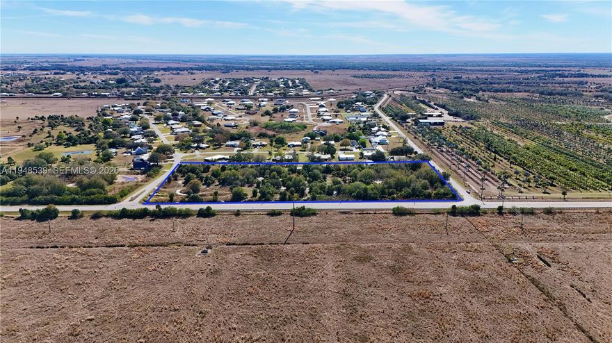 5.5 acres of vacant land in Okeechobee, Florida! This spacious parcel offers paved frontage along Hwy 70 W and a great opportunity for a custom home with plenty of room for a shop, storage, or recreational space. Conveniently located near established residential areas with easy access to local shopping, dining, and main roads. Ideal for buyers seeking extra land, as well as builders or investors looking for acreage in a growing area. Potential for a future lot split may exist—buyer to verify zoning, minimum lot requirements, access, and any subdivision approval directly with Okeechobee County.