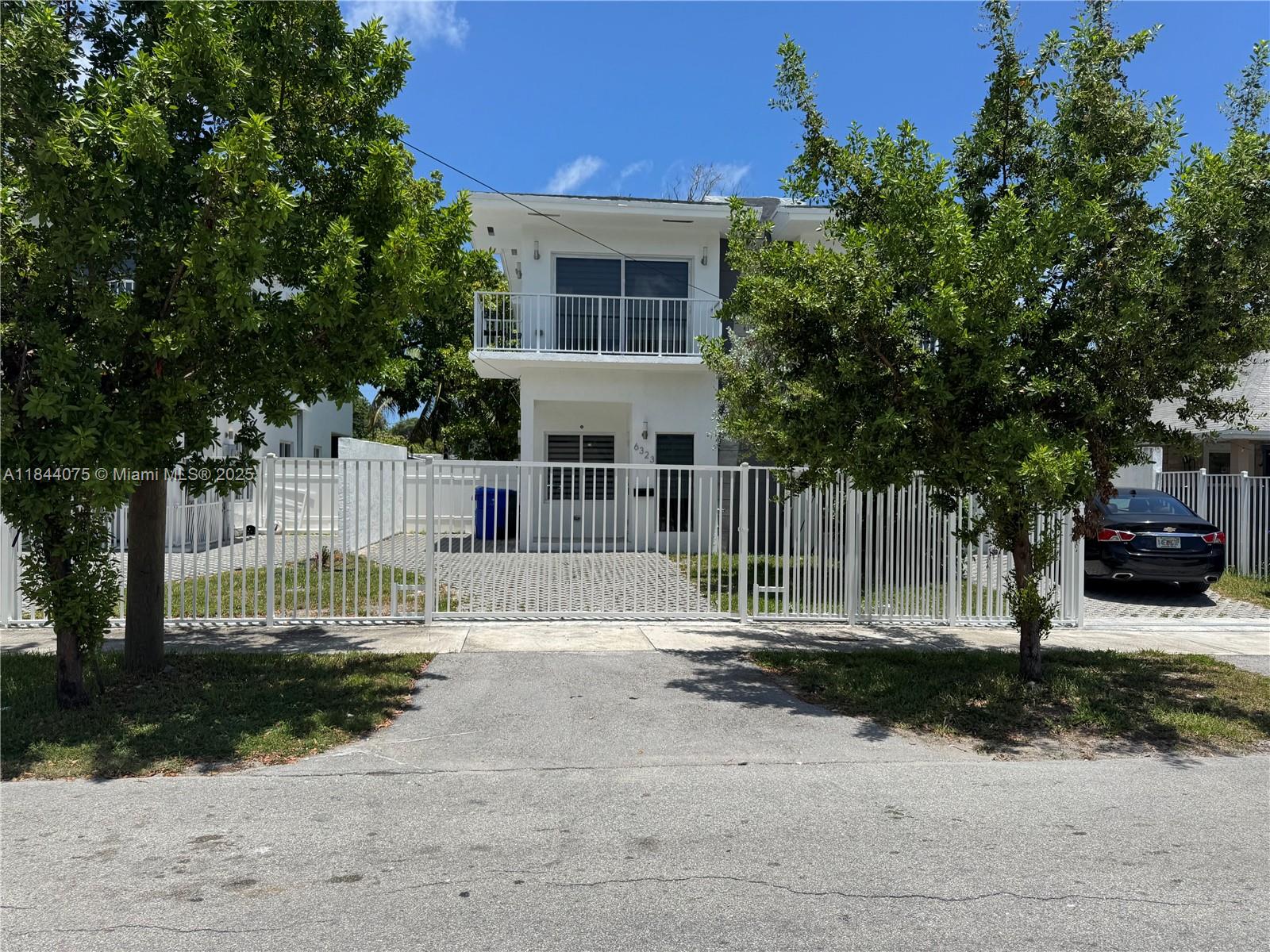 Recently Built Townhome with an Open Concept Layout Living Room, Dining Room and Kitchen; Great Space for Entertaining! Powder Room/Bathroom for your Guests on the 1st Floor with Brand New Washer/Dryer Conveniently located inside the unit. 2nd Floor has 3 Bedrooms 2 Bathrooms. All Impact Windows and Doors. Porcelain Tile Throughout. Kitchen with Quartz Countertops and Stainless Steel Appliances. Everything is new. Custom Zebra Blinds throughout the entire Townhome. Recently added surrounding Fencing privatizing front and back yard. Property has had upgrades. Must See!