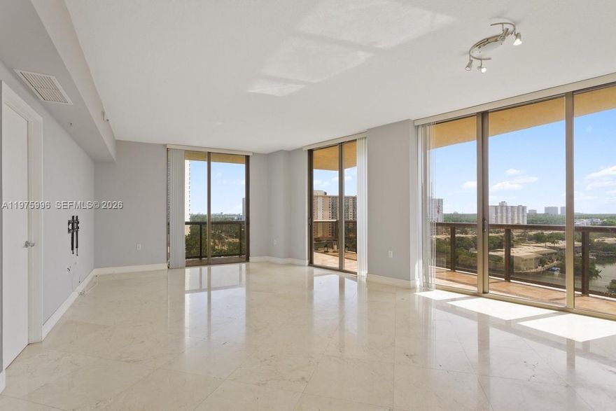 Don't miss this fantastic opportunity to own a beautiful oceanfront condo in Sunny Isles Beach! This spacious 2-bedroom, 2.5-bath unit boasts a large wrap-around balcony offering breathtaking views of the ocean and Intracoastal waterway. The bright, open layout includes floor-to-ceiling windows and elegant marble floors throughout. As a resident of this full-service building, you’ll enjoy premium amenities such as beach services for your relaxation by the water. Stay active in the well-equipped gym, and benefit from 24-hour concierge and valet services. Conveniently located within walking distance of supermarkets, banks, restaurants, and more!