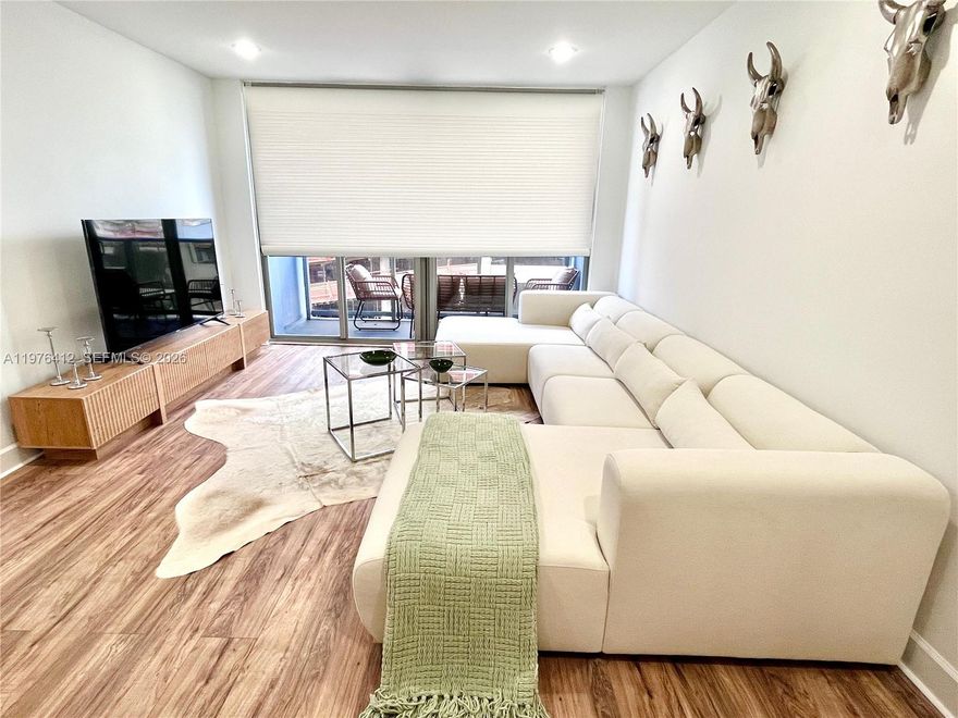 Newly furnished and spacious 1 bed / 1 bath at 401 BLU featuring extended balcony, walk-in closet, impact windows, stainless steel appliances, tiled kitchen, and laminated wood floors. Nicely decorated with brand-new furniture and TV, never lived in. The unit comes fully equipped with kitchenware, dining ware, towels, sheets, and essentials, making it truly move-in ready. A/C included in HOA for lower electric bills. Building amenities include rooftop pool, fitness center, 24/7 front desk/security, and parking. Prime location within walking distance to Publix, Starbucks, restaurants, shops, and the beach. Minutes from South Beach, Bal Harbour, and Downtown. Available for 6 months starting now. Schedule your showing today!