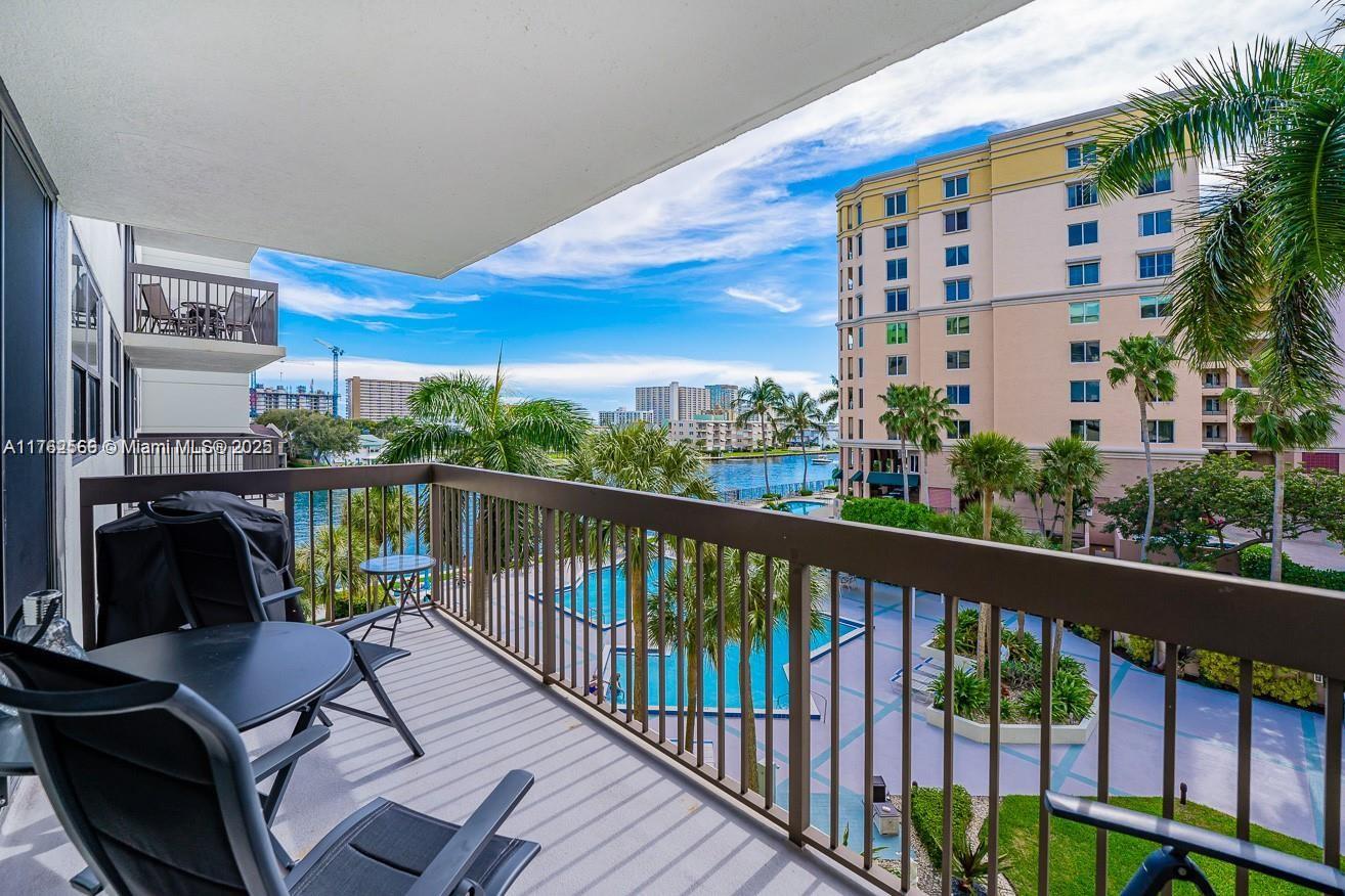 SOUTH-FACING LARGE REMODELED UNIT WITH SPLIT FLOOR PLAN AND INTRACOASTAL VIEWS FROM EVERY WINDOW - ALL IMPACT! THE OPEN KITCHEN AND LIVING ROOM PLAN ALLOW FOR MAXIMUM LIGHT WITH IMPACT SLIDERS. THE MAIN BEDROOM HAS A LARGE WALK-IN CLOSET WITH BUILT-INS THAT COMPLIMENT AN EN-SUITE BATHROOM WITH AN OFFICE WORK AREA. THE LARGE SECOND BEDROOM FEELS LIKE ANOTHER MASTER BEDROOM. LARGE TOP LOADING WASHER DRYER IN UNIT. POOL FACES DIRECTLY ON THE INTRACOASTAL. CABLE & INTERNET INCLUDED. PET FRIENDLY - 2 pets WELCOMED! PARTY ROOM, GYM, BILLIARDS, 24 HR SECURITY, AND COVERED PARKING. THIS CAN BE A GREAT HOME OR EXCELLENT INVESTMENT PROPERTY. CAN RENT AFTER ONE YEAR. THE BUILDING HAS BEEN RENOVATED WITH A FASHIONABLE LOBBY AND HALLWAYS. 40-YEAR-INSPECTION COMPLETE! NEW ROOF TOO! ASSESSMENTS PAID!