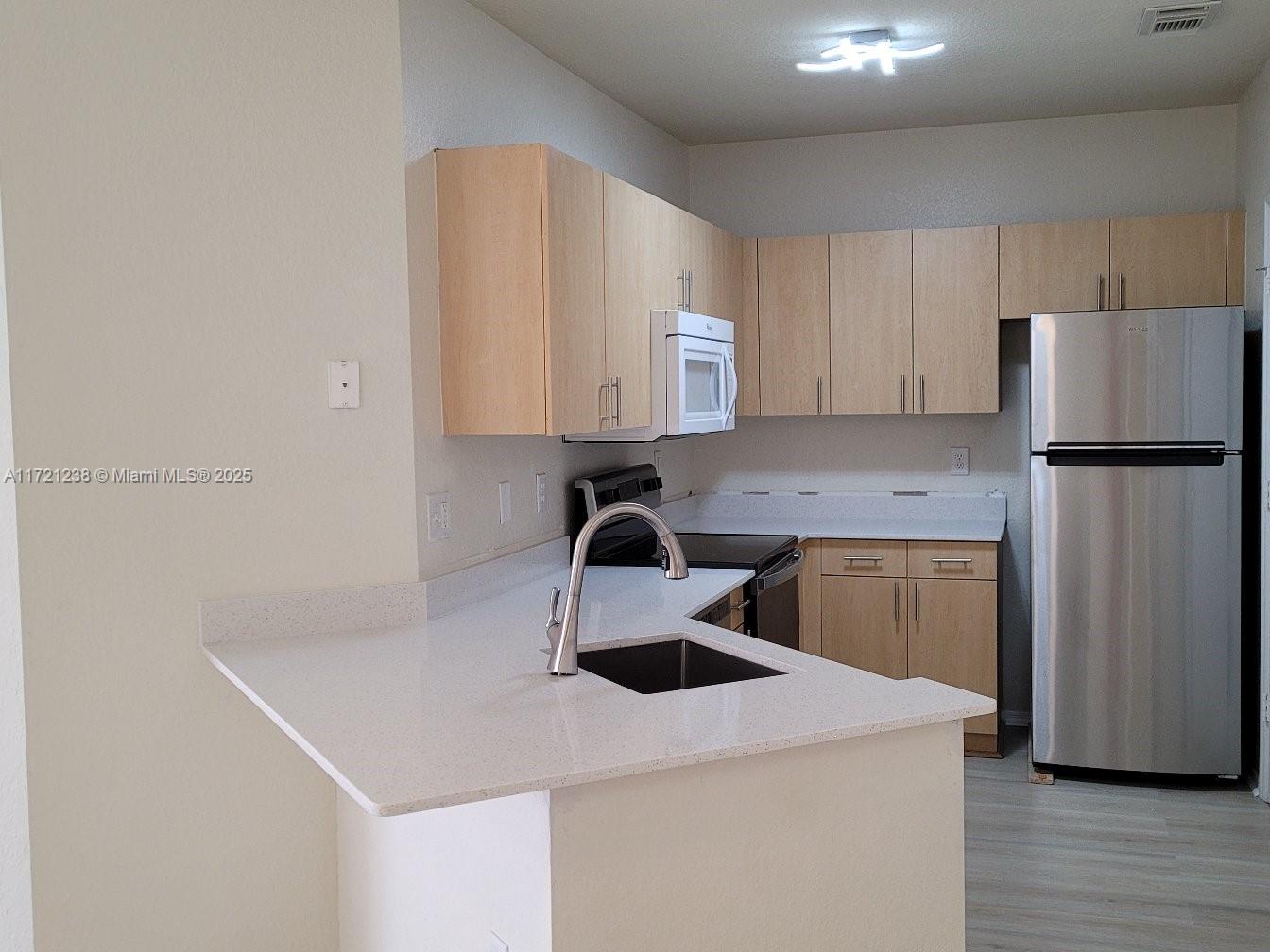 RESIDENCES OF BELMONT AT - Residential Lease