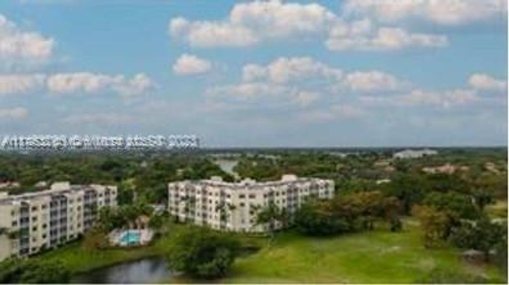Photo of 3600 Oaks Clubhouse Dr #509, Pompano Beach, FL 33069 (MLS # A11879538)