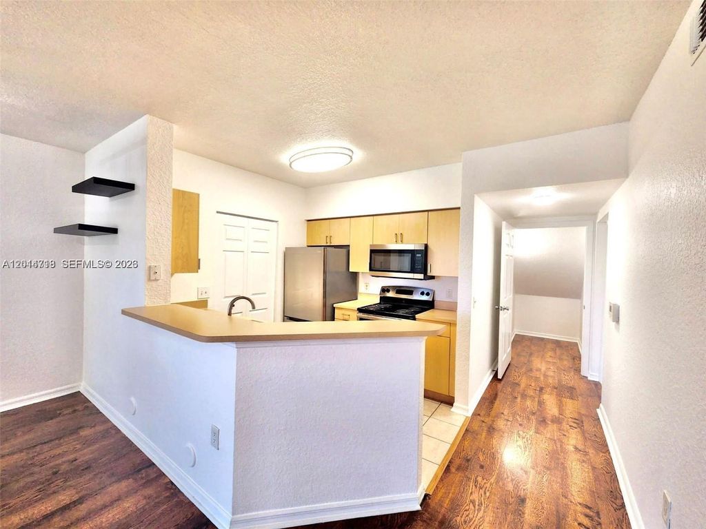 Photo of 2209 Belmont Ln #2209, North Lauderdale, FL 33068 (MLS # A12014718)