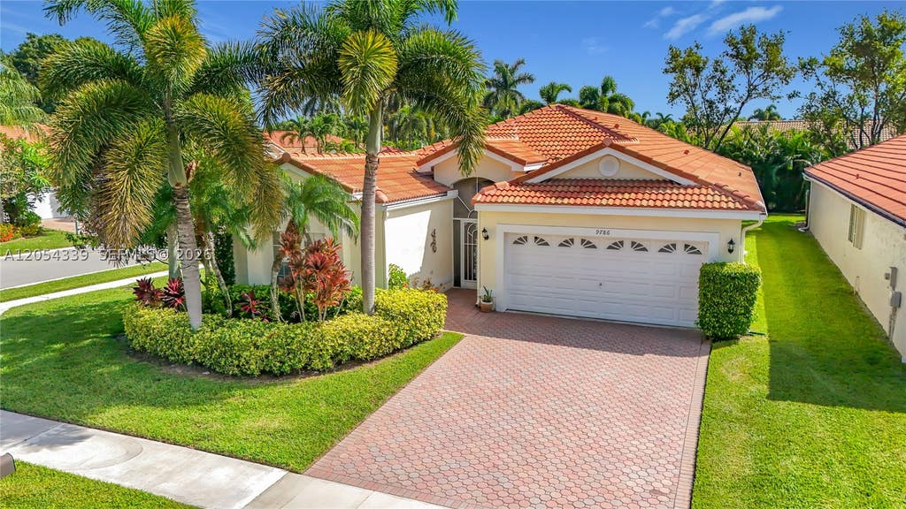 Photo of 9786 Lemonwood Ct, Boynton Beach, FL 33437 (MLS # A12054339)