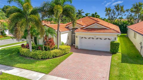 Photo of 9786 Lemonwood Ct, Boynton Beach, FL 33437 (MLS # A12054339)