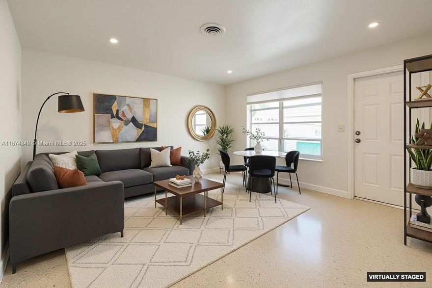 Welcome to this inviting 2-bedroom, 1-bath home located in a lovely Wilton Manors neighborhood. Enjoy a partial water view and timeless terrazzo floors that bring character and charm throughout. The home features a laundry room with full-size washer and dryer, fresh interior paint, and a private patio off the kitchen—perfect for relaxing or entertaining. This residence combines comfort and a prime location, offering the perfect opportunity to enjoy the sought-after Wilton Manors lifestyle.