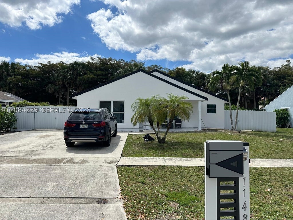 Photo of 1148 Grandview Cir, Royal Palm Beach, FL 33411 (MLS # A12084225)