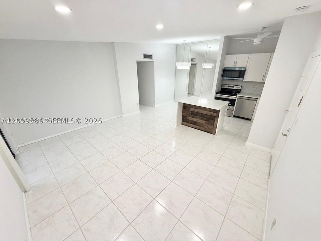 Photo of 7857 Ashmont Cir #213, Tamarac, FL 33321 (MLS # A12039586)