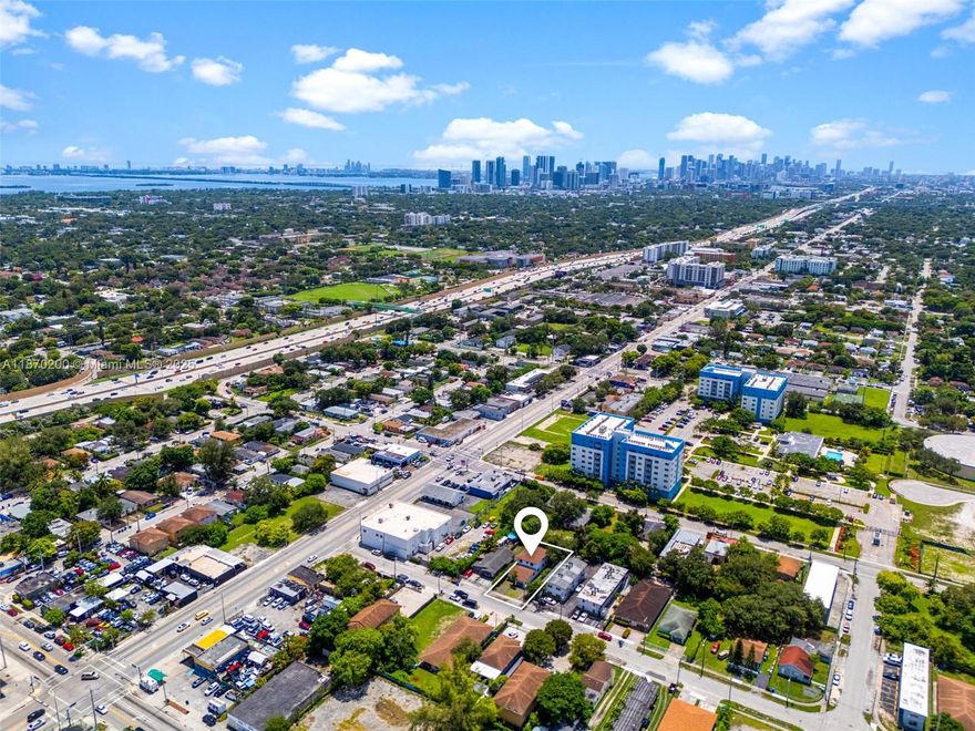 New Contruction 2 Story Triplex in the Heart of Miami. Completely furnished. New Roof, New Impact Windows, New Tile, New Electric, New Plumbing, New Driveway, New kitchen and more. All appliances are stainless steel. Flawless interior decor. Fully renovated triplex with strong income potential in turn-key condition. Front building features a spacious newly renovated 3BR/2BA house with its own kitchen. Rear building is a 2-story duplex with two updated units, each with full kitchens, private entry and laundry room. Each of the rear units are 3BR/2BA. Turnkey investment, ideal for owner-user or investor. Strong rental potential and low maintenance. Total projected income: $10,000/mo. Don’t miss this move-in-ready asset with income-producing opportunity! Completely renovated! Call to See!